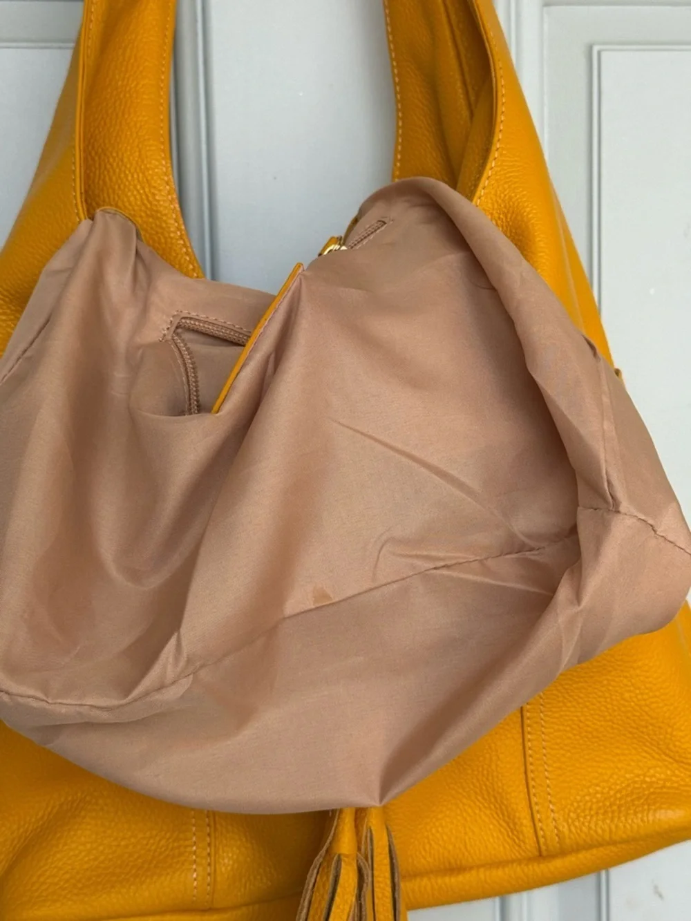 Laggo Havana hobo bag crafted from pebbled genuine leather.